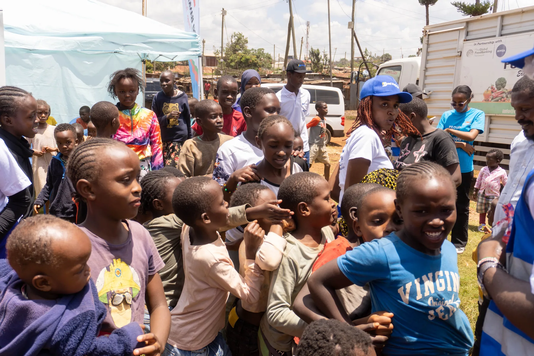 Community members and Uzapoint volunteers together