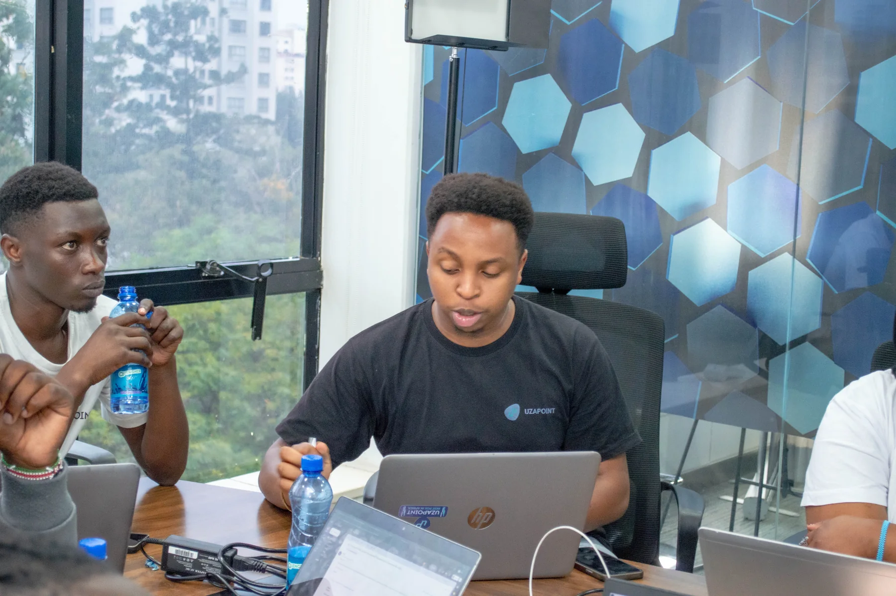 Future Uzapoint partners collaborating during a training session